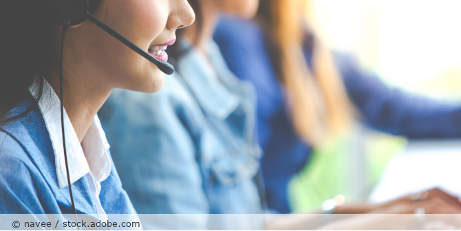 Woman wearing a headset.