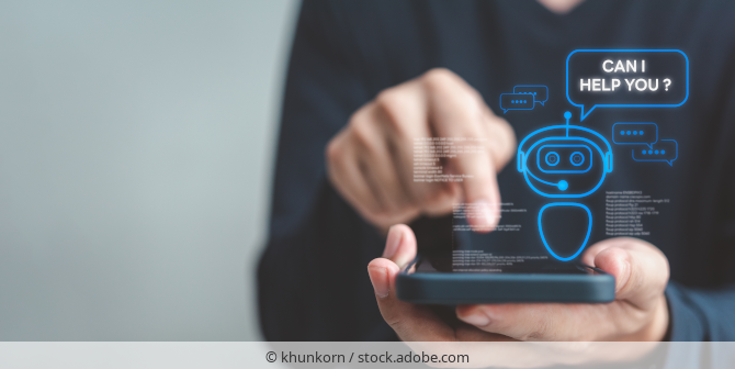 Man holding a smartphone and tapping on it. In the foreground is an illustration of a chatbot asking: Can I help you?