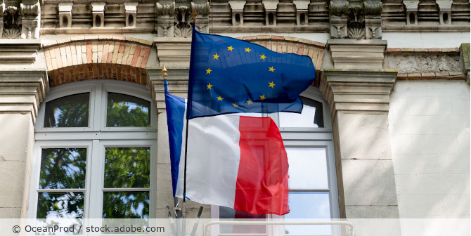 France and EU flags.