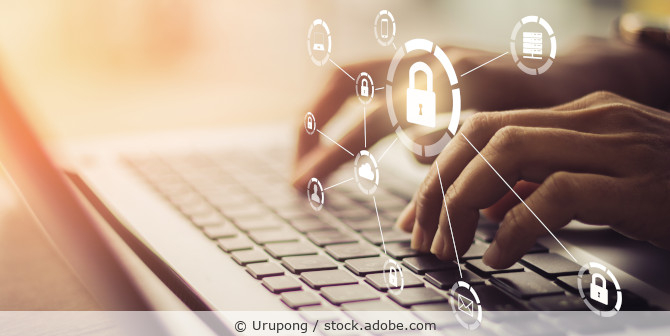 Man typing on a keyboard with data security symbols overlaid.